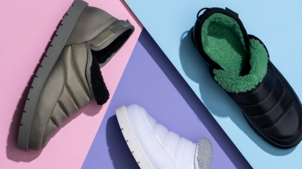 Three slippers in gray, white, and black with green lining on pink, purple, and blue backgrounds