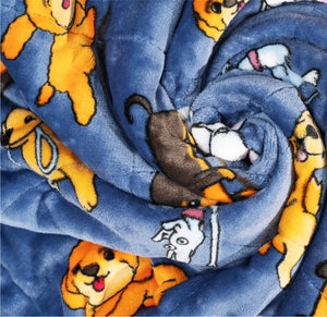 Blue fleece fabric with cartoon dogs in various poses, including a brown dog and a white dog with a pink tongue.
