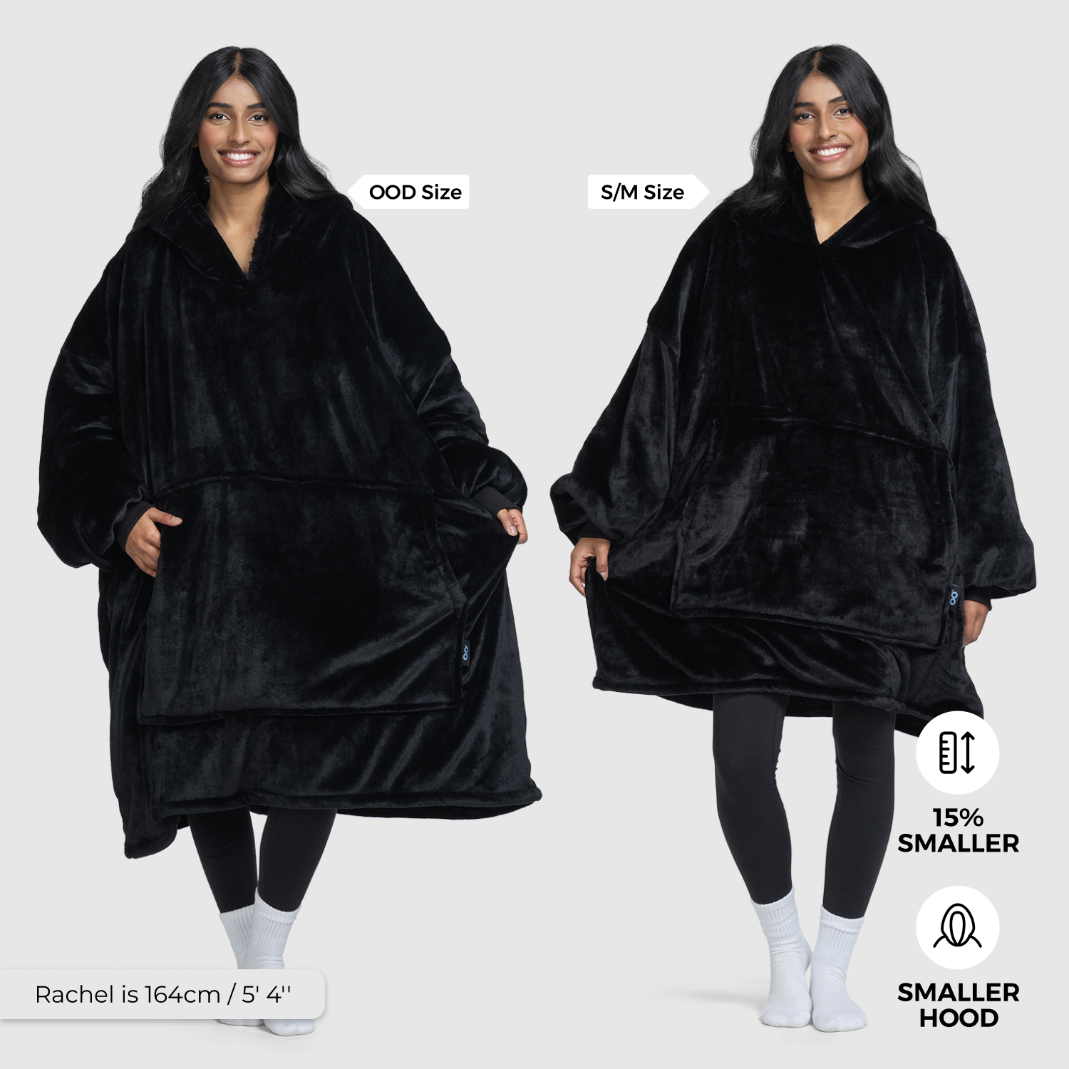 Woman modeling a black wearable blanket in two sizes labeled "OOD Size" and "S/M Size" with text "Rachel is 164cm / 5'4"", "15% SMALLER", and "SMALLER HOOD" visible.