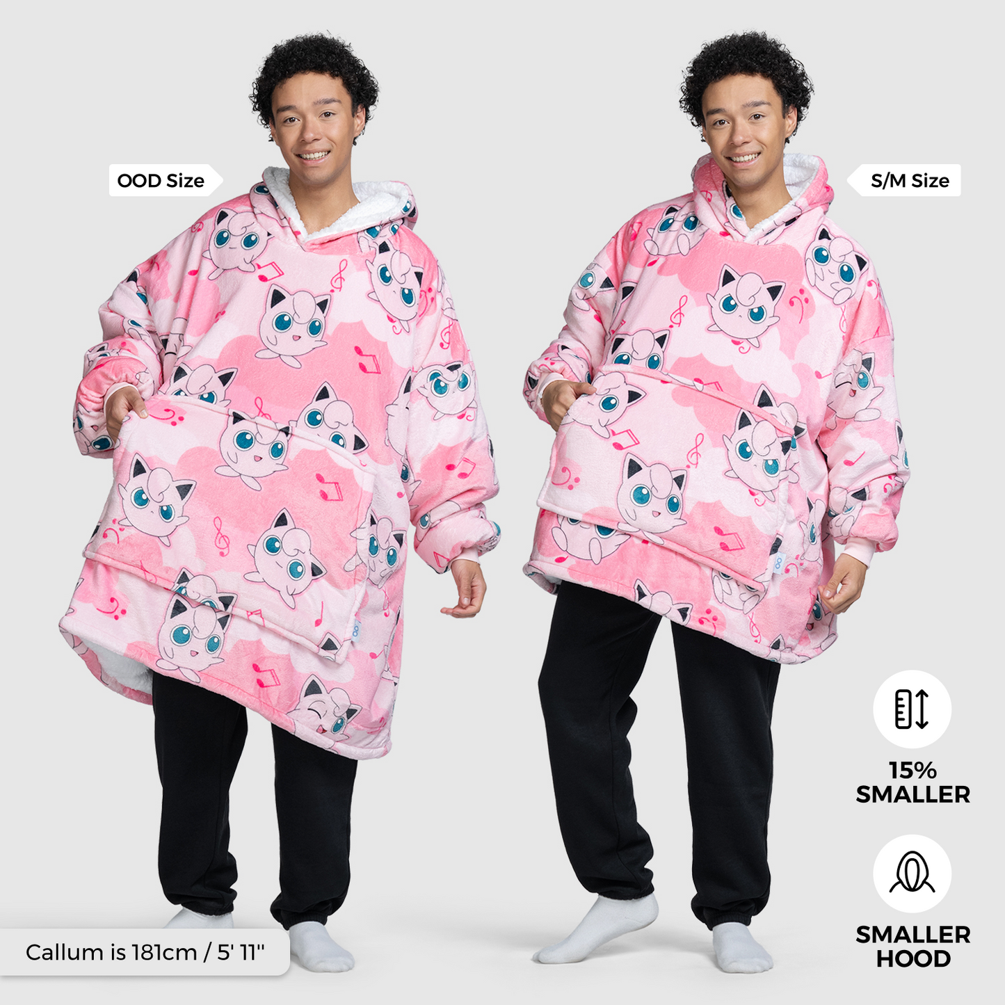 Two images of a person wearing a pink oversized wearable blanket with Pokémon Jigglypuff faces, showing OOD Size on the left and S/M Size on the right. Text labels: 'OOD Size', 'S/M Size', 'Callum is 181cm / 5' 11