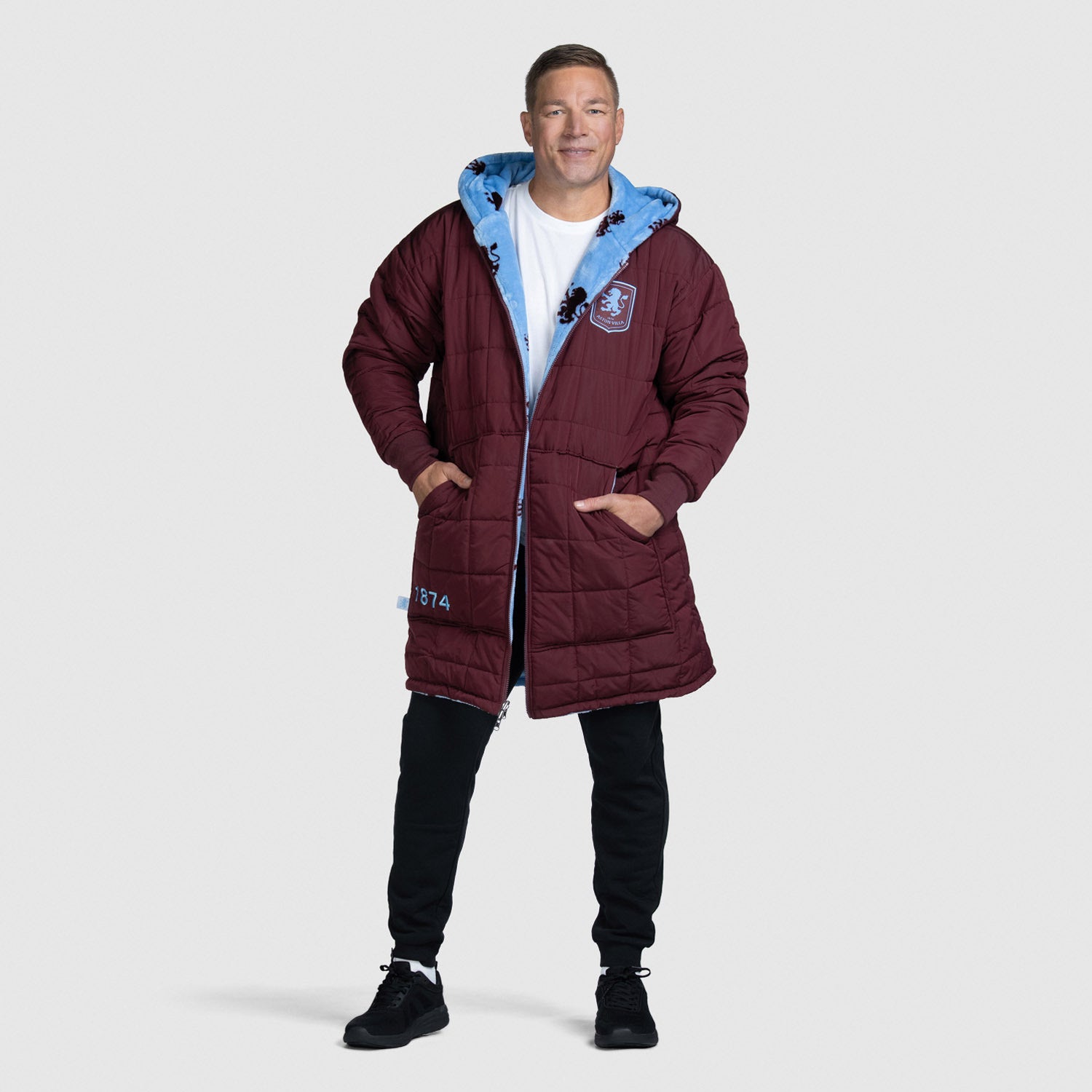 Man wearing a zip through Aston Villa outdoor jacket size: Steven is 6” wearing a size OOD