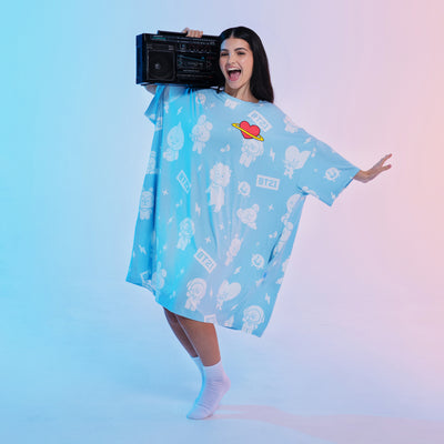 Woman holding a boombox wearing a blue oversized BT21 character print shirt