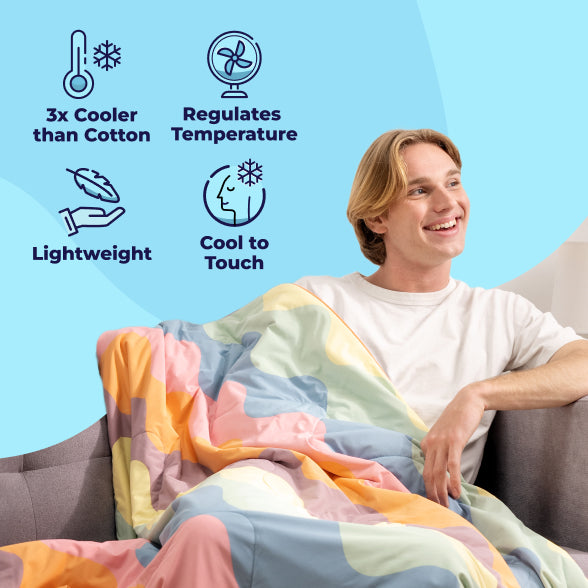 Smiling young man sitting on a couch covered with a colorful pastel blanket. Icons with text: 