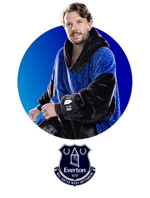 Man wearing a blue and black Oodie garment with Everton logo below
