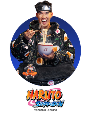 Man wearing Naruto-themed hoodie and headband eating ramen from Naruto bowl with Naruto Shippuden logo below