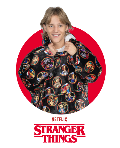 Young person wearing a black jacket with colorful character patches, smiling against a red circular background