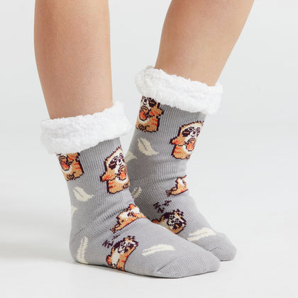 Gray sherpa-lined ankle socks with white cuffs and repeating cartoon pug faces and cream leaf motifs, shown on feet